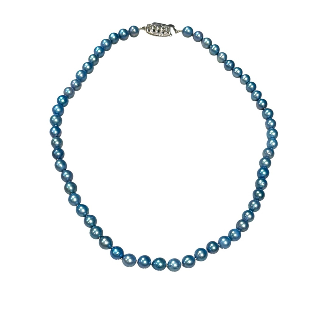 Blue Pearls, 17” strand with silver clasp with stones.